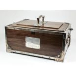A George V walnut and silver mounted three-handled rectangular cigar box, the plain mounts with