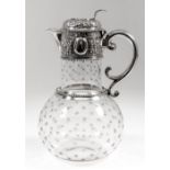 A Victorian silver mounted and bulbous glass claret jug, the silver mounts with bead ornament and