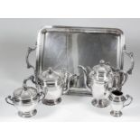 A French plated five piece tea and coffee service of circular form with moulded mounts, berry