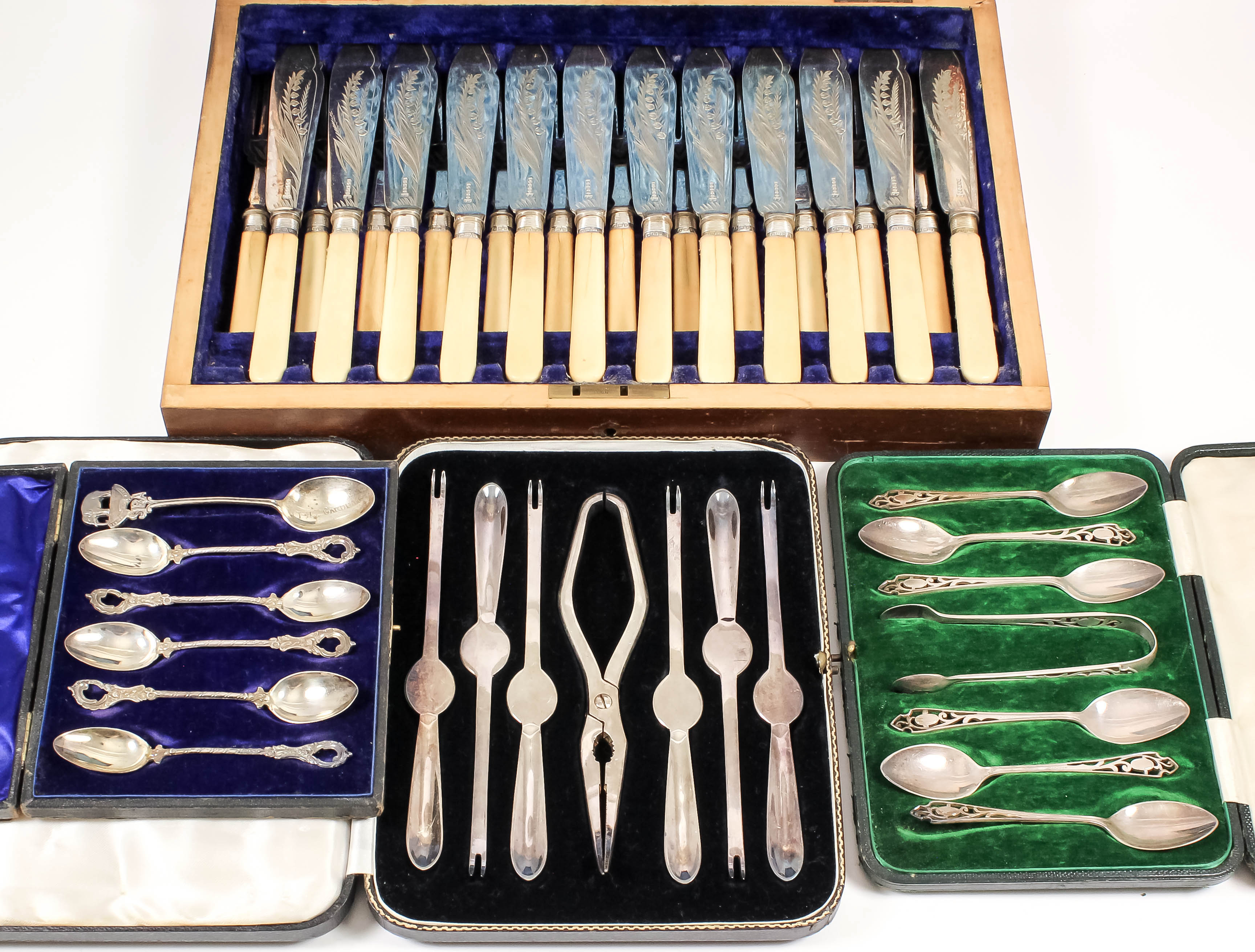 A set of twelve late Victorian plated and bone handled fish knives and fish forks, with engraved