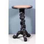 A Chinese hardwood circular tripod occasional table, the top inset with rouge marble slab and with