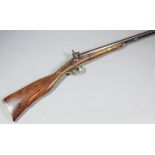A 19th Century Continental 28 bore side by side muzzle loading percussion cap fowling piece, the