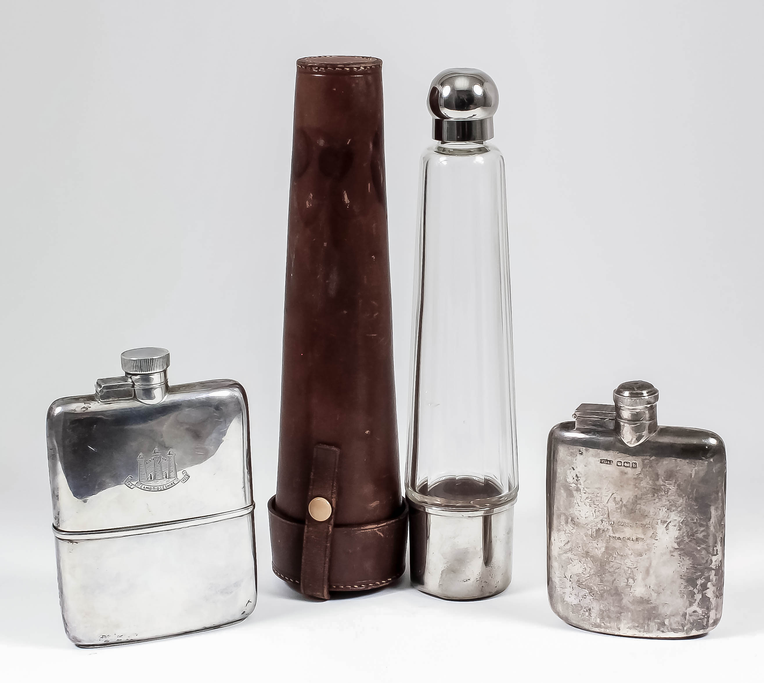 A George V silver rectangular hip flask with bayonet top and removable cup, and engraved "The