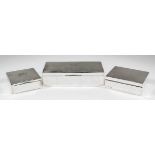 An Indian silvery metal rectangular cigarette box, 7ins wide x 3ins deep x 2ins high, by Barton of