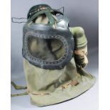 A Second World War British infant gasmask (gas hood), metal framework bearing mark "PPJ1941", with