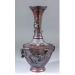 A Chinese bronzed metal baluster vase, the body of hexagonal outline, with applied birds amongst