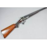 A good 12 bore side by side hammer action shotgun by J & W Tolley of London, Serial No. 7882, the