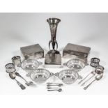 Four George V silver circular two-handled dishes with pierced sides and pierced handles, 4ins