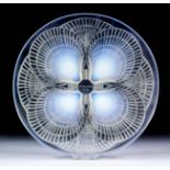 A Lalique "Coquilles" opalescent glass dish, 11.75ins diameter (with engraved mark "R. Lalique