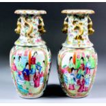 A pair of 19th Century Chinese "Cantonese" porcelain vases of slender form, enameled in colours with