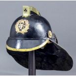 A late 19th/early 20th Century Continental steel, leather and brass Fireman's helmet with applied