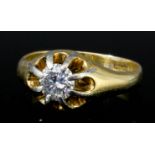 A gentleman's 18ct gold and platinum mounted solitaire diamond ring, the raised claw setting