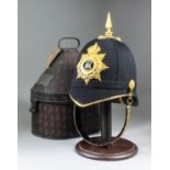 A dress helmet of the First Battalion the Suffolk Regiment, the former property of the late