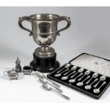 A George V silver two handled prize cup with moulded rim and girdle, C-scroll handles on circular