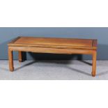 A Chinese hardwood rectangular coffee table with flush panelled top, on square moulded legs,