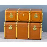 Two mid 20th Century Dutch metal bound brown canvas travelling trunks with beechwood strengthening