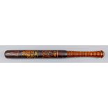 An early Victorian turned hardwood truncheon painted with decorative triangular motif over royal