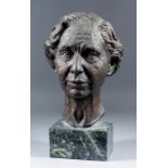 Elizabeth Flewers - 20th Century British - Bronze bust "Paddy", on polished green marble base, 15ins