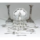 A pair of George V silver pillar candlesticks, the stop fluted columns with Corinthian capitals