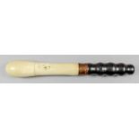 A 19th/20th Century turned ivory truncheon with hardwood handle with metal ferrule, 12.25ins