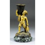 19th Century Continental school - Gilt bronze figure of a young fisher boy carrying a basket on