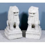 A pair of 19th/20th Century Italian carved limestone figures of seated Kylin with open mouths