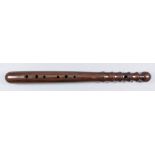 An early 20th Century turned rosewood truncheon with fingerholes for a recorder, stamped "Rugd 28149