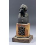 19th Century Continental school - Bronze bust of Demosthenes, on octagonal marble and stepped square