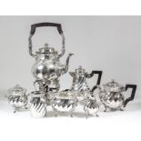 A late 19th/early 20th Century Dutch silver seven-piece tea service with bulbous spiral fluted