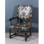 A 19th Century Continental walnut open armchair of large proportions of "17th Century" design, the