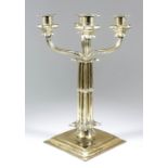 A Charles II silver gilt pillar candlestick with later four-light candelabra branch,