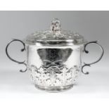 A James II silver two-handled cup and cover, the slightly domed cover with cast melon and leaf