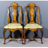 A pair of 19th Century Dutch walnut and marquetry high back dining chairs of "early 18th Century"
