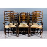 A set of six ash and beechwood ladder back rush seated dining chairs (including two armchairs), on
