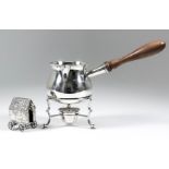 An Elizabeth II silver brandy warmer with plain circular bulbous body and turned wood handle, 4ins x