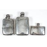 A late Victorian silver rectangular hip flask with bayonet top and removable cup with moulded rim,