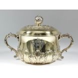 A George V silver gilt two-handled cup and cover of "17th Century" design, the domed cover with bold