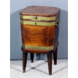 A George III mahogany and brass bound octagonal wine cooler with moulded edge to top, lined four