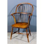 A 19th Century ash and elm seated stick back Windsor armchair with two tier stick back, dish seat on