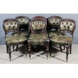 A set of six Victorian mahogany dining chairs with moulded showwood spoon backs, seats and backs