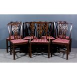 A set of seven early 20th Century mahogany dining chairs (including one armchair) by John