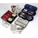 A late Victorian silver presentation table set, comprising - Stilton cheese scoop, pickle fork and