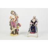 NINETEENTH CENTURY STAFFORDSHIRE POTTERY FIGURE OF QUEEN VICTORIA, painted in colours and gilt and