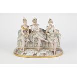 NINETEENTH CENTURY DRESDEN, GERMAN LACE PORCELAIN GROUP, modelled s three ballerinas seated on a