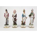 SET OF FOUR MODERN CONTINENTAL PORCELAIN FIGURES OF NAPOLEONIC SOLDIERS, each painted in colours and