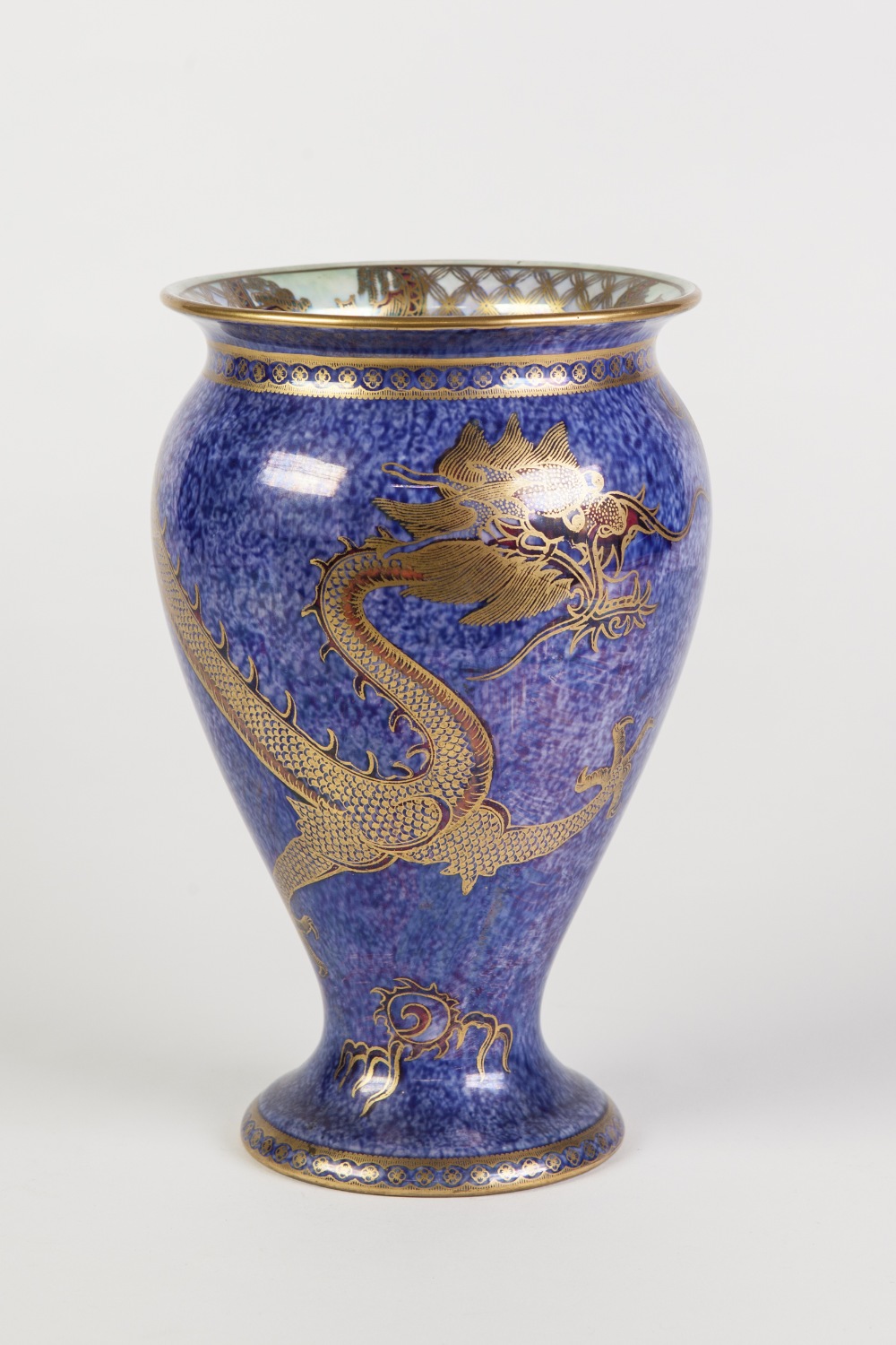 WEDGWOOD 'DRAGON' LUSTRE CHINA VASE, of footed ovoid form with lipped rim, the exterior gilt printed