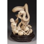 EXCEPTIONALLY FINE JAPANESE MEIJI PERIOD ONE PIECE CARVED IVORY OKIMONO OF A PEASANT FARMER startled