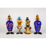 COLLECTION OF EIGHT COLOURED GLASS FIGURES OF CLOWNS, seven modelled standing, the other in the form