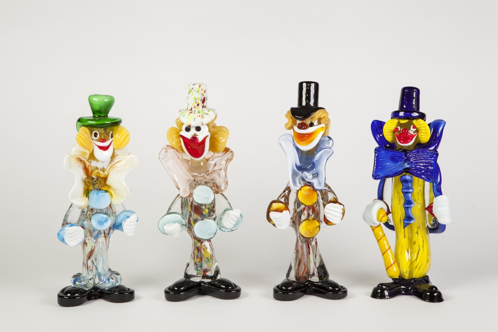 COLLECTION OF SEVEN COLOURED GLASS FIGURES OF CLOWNS, all modelled standing, 12 ¼" (31.1cm) high and