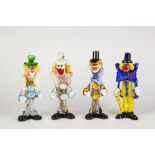 COLLECTION OF SEVEN COLOURED GLASS FIGURES OF CLOWNS, all modelled standing, 12 ¼" (31.1cm) high and